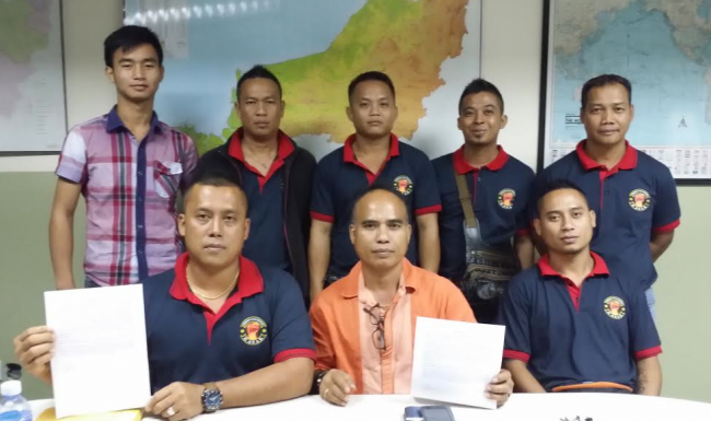 TR Jambai Anak Jali sitting 2nd left. Andrew Anak Empin sitting 1st left.